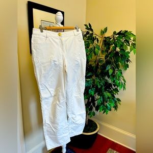 St. John Caviar White straight leg pants with gold button detail.